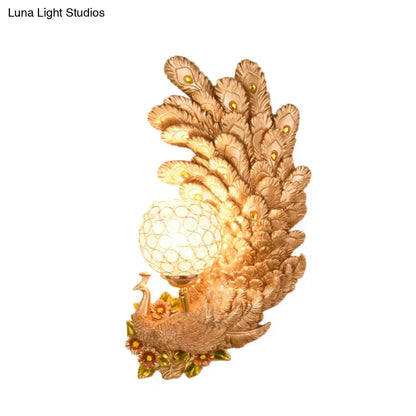 Golden peacock wall light with crystal shade, gold feather motif by Decorbites on Tampa Home & Garden Store