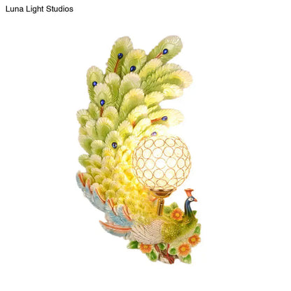 Golden peacock wall light with crystal shade, yellow and green feathers by Decorbites on Tampa Home & Garden Store