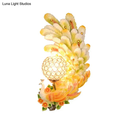 Golden peacock wall light with crystal shade and yellow-green plumage for living room decor on Tampa Home & Garden Store