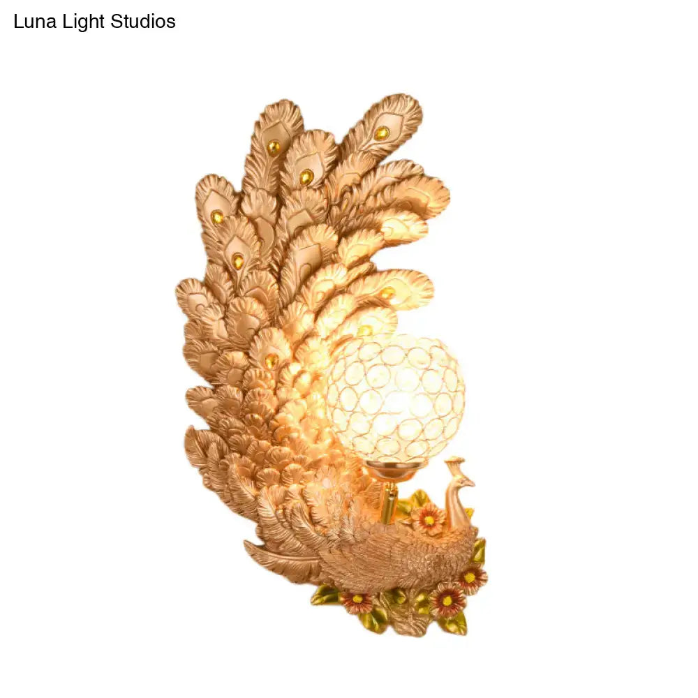 Golden peacock wall light with crystal shade, ornate gold plumage, Decorbites on Tampa Home & Garden Store