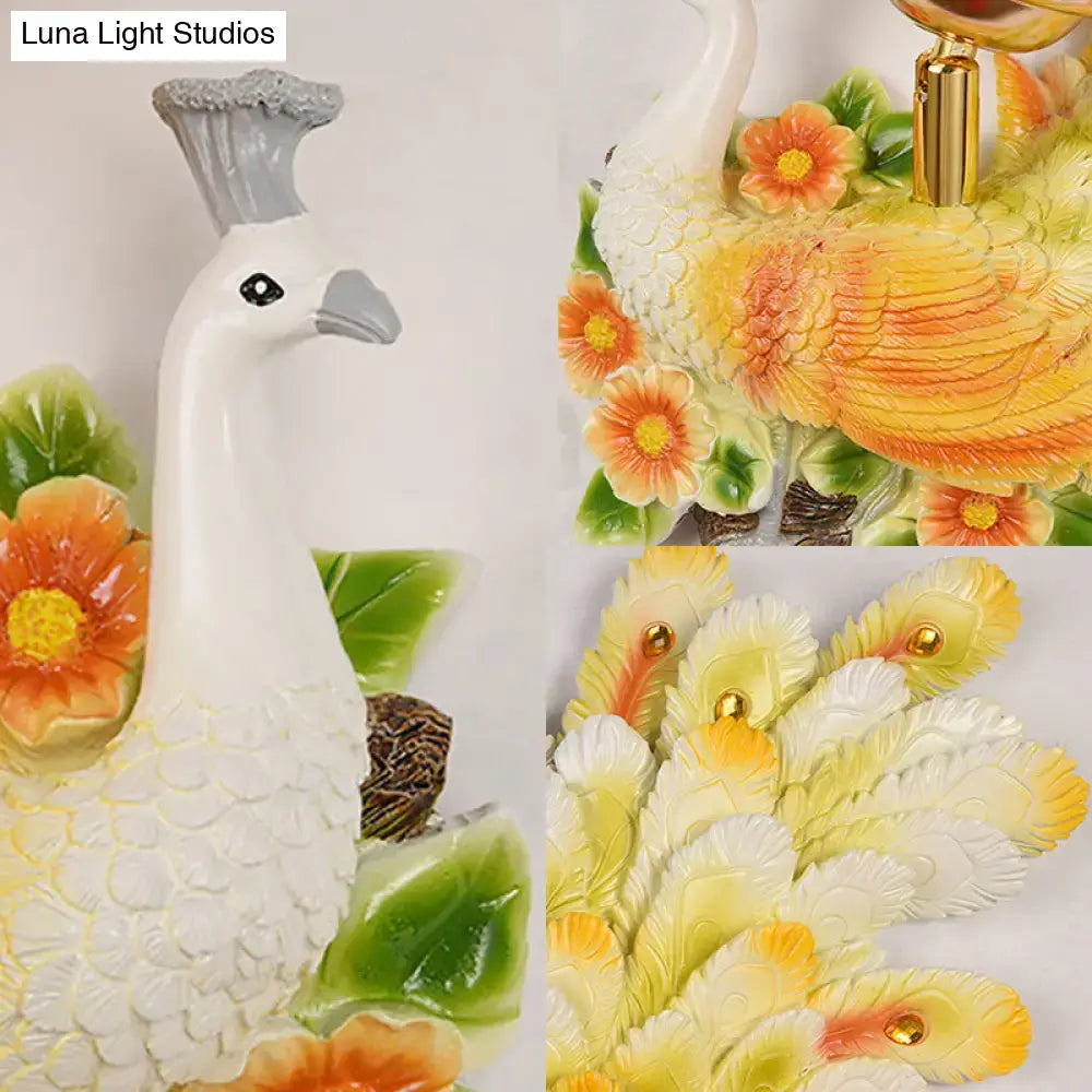 Golden peacock wall light with crystal shade in yellow-green ceramic finish by Decorbites on Tampa Home & Garden Store