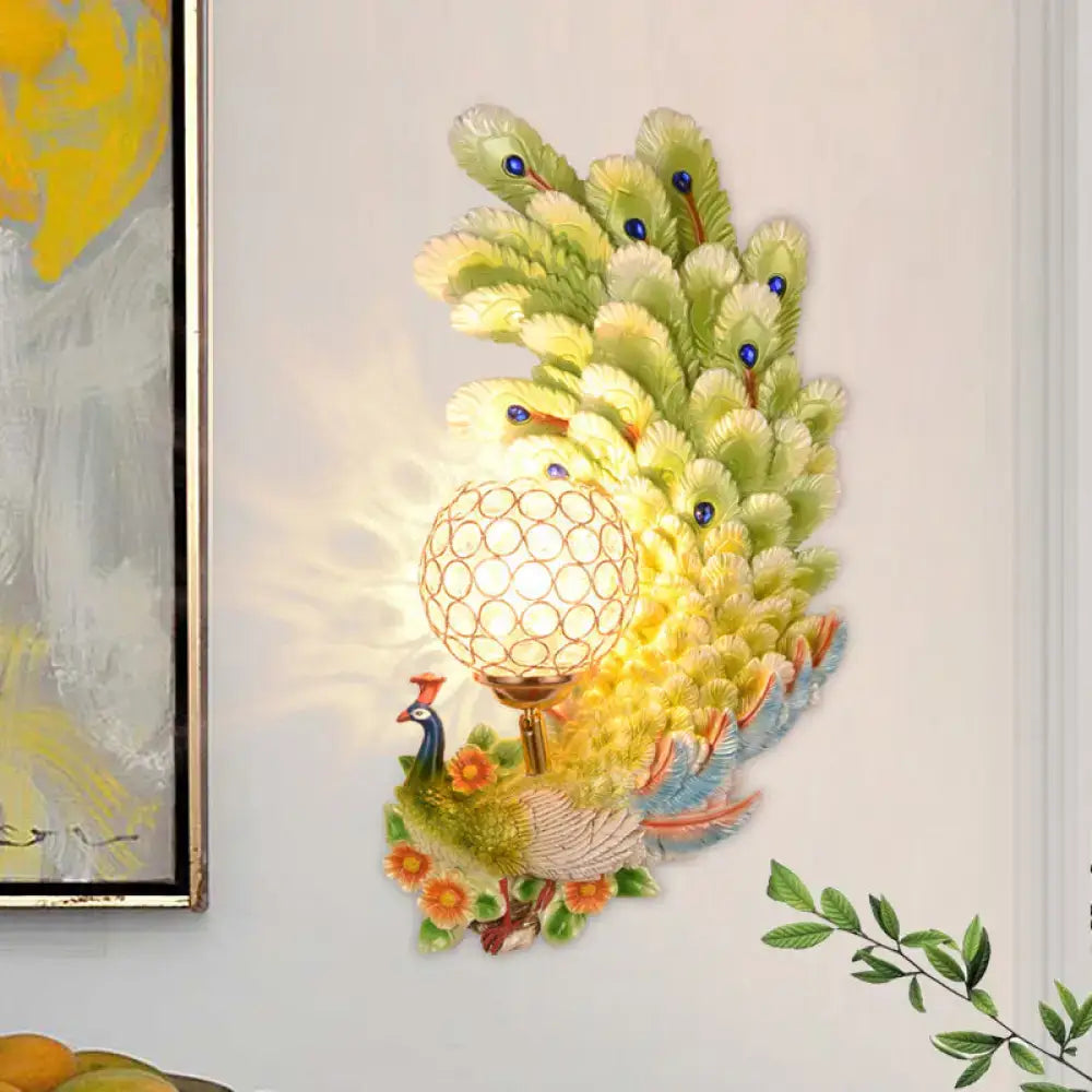 Decorbites golden peacock wall light with crystal shade, yellow-green feathers on Tampa Home & Garden Store