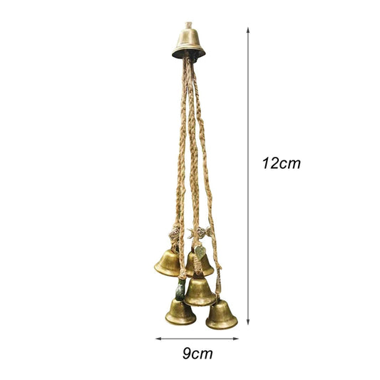 Wind chimes with six golden brass bells and braided rope tassels on Tampa Home & Garden Store