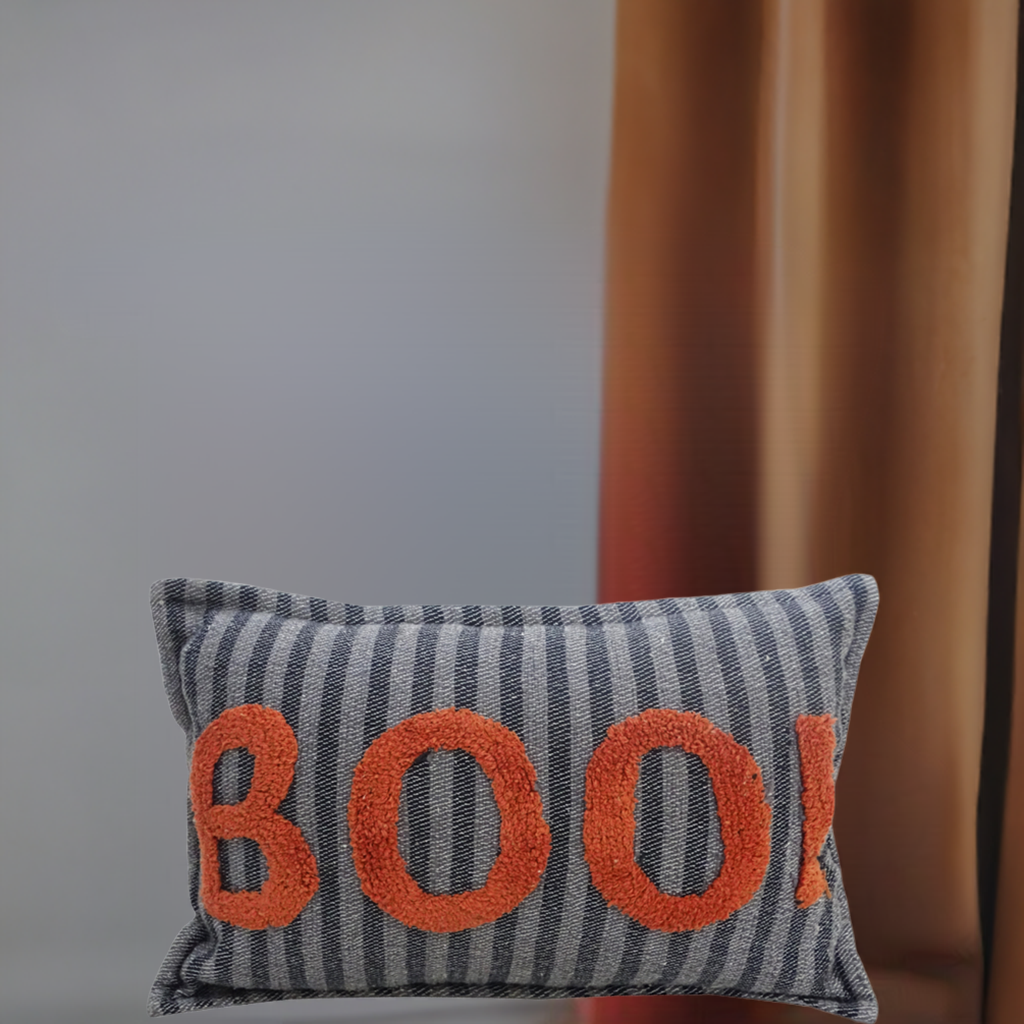 Vibhsa throw pillow blue striped fabric with textured orange BOO lettering on Tampa Home & Garden Store