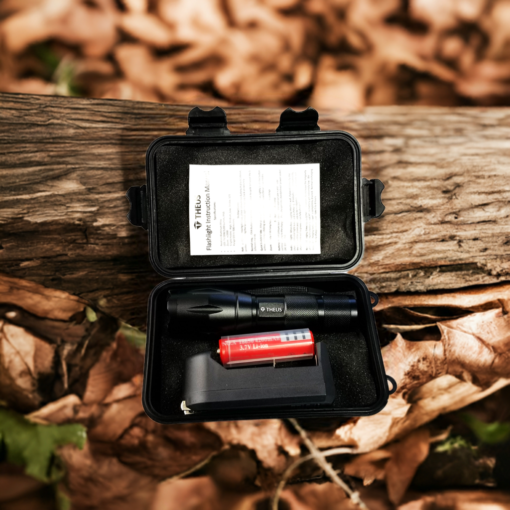 THEUS Rechargeable Flashlight Kit in a hard case; black flashlight, red Li-ion battery, charger on Tampa Home & Garden Store