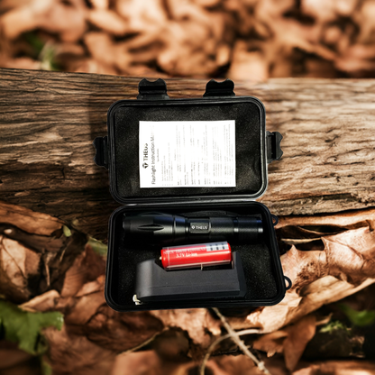 THEUS Rechargeable Flashlight Kit in a hard case; black flashlight, red Li-ion battery, charger on Tampa Home & Garden Store