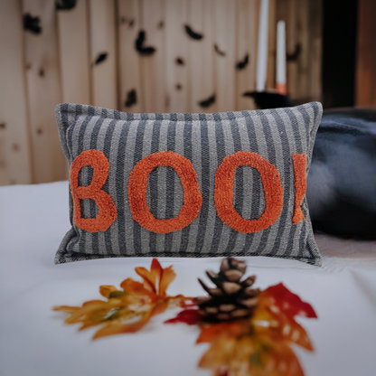 Vibhsa Halloween throw pillow 14x24 with gray striped fabric and orange textured BOO letters on Tampa Home & Garden Store