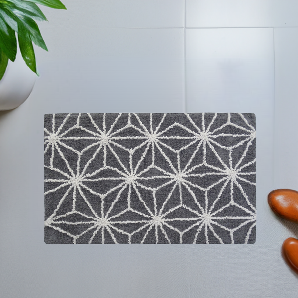 Vibhsa bath rug with grey and ivory geometric pattern, textured loop pile on Tampa Home & Garden Store