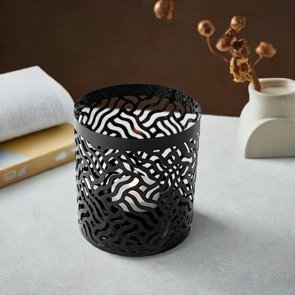 Vibhsa black laser-cut votive candle holder, metal with intricate wavy cutouts on Tampa Home & Garden Store