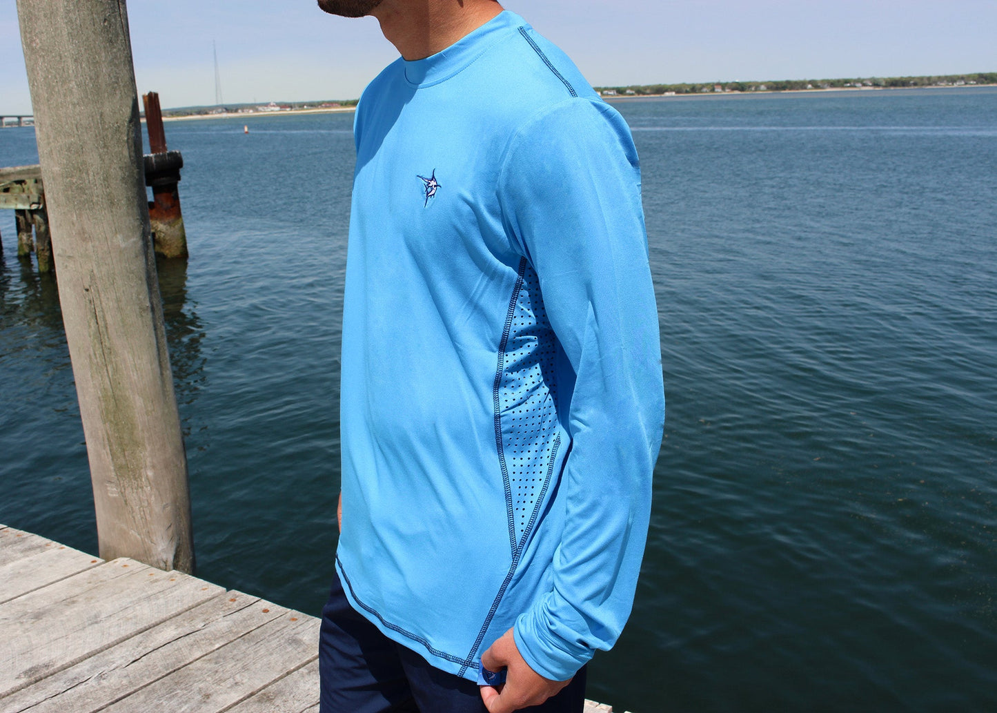 Grander Performance Tee light blue with mesh side panel and White Water Life logo on Tampa Home & Garden Store