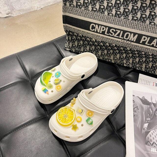 White Stevvex slip-on garden sandals with lemon citrus print, non-slip, lightweight pair on Tampa Home & Garden Store