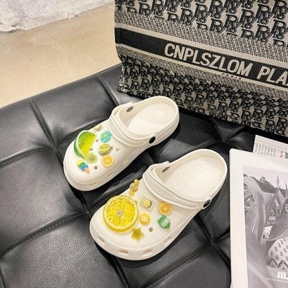 White Stevvex slip-on garden sandals with lemon citrus print, non-slip, lightweight pair on Tampa Home & Garden Store