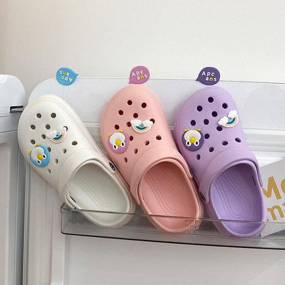 Stevvex women's slip-on garden clogs in white, pink, and lavender with holes and cartoon charms on Tampa Home & Garden Store