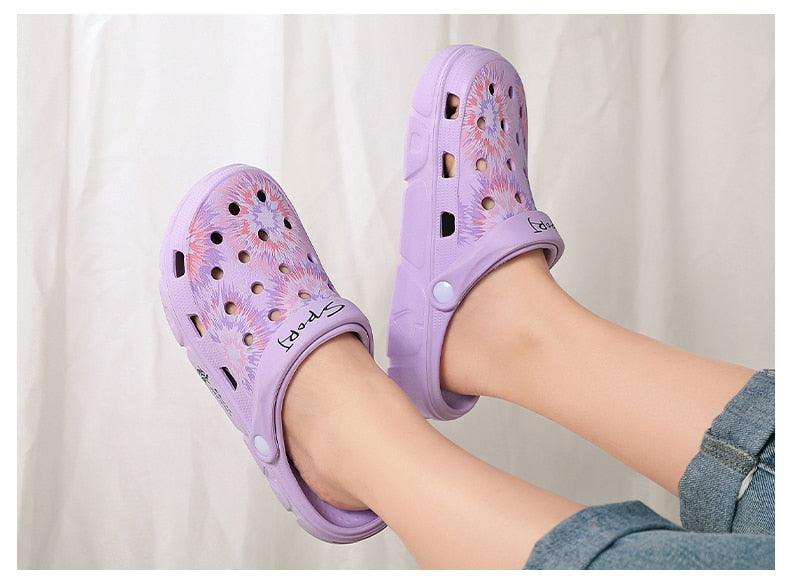 Pair of lavender Stevvex women's slipon garden sandals with perforated uppers and non-slip soles on Tampa Home & Garden Store