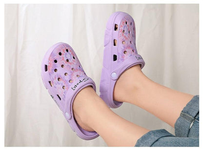 Pair of lavender Stevvex women's slipon garden sandals with perforated uppers and non-slip soles on Tampa Home & Garden Store