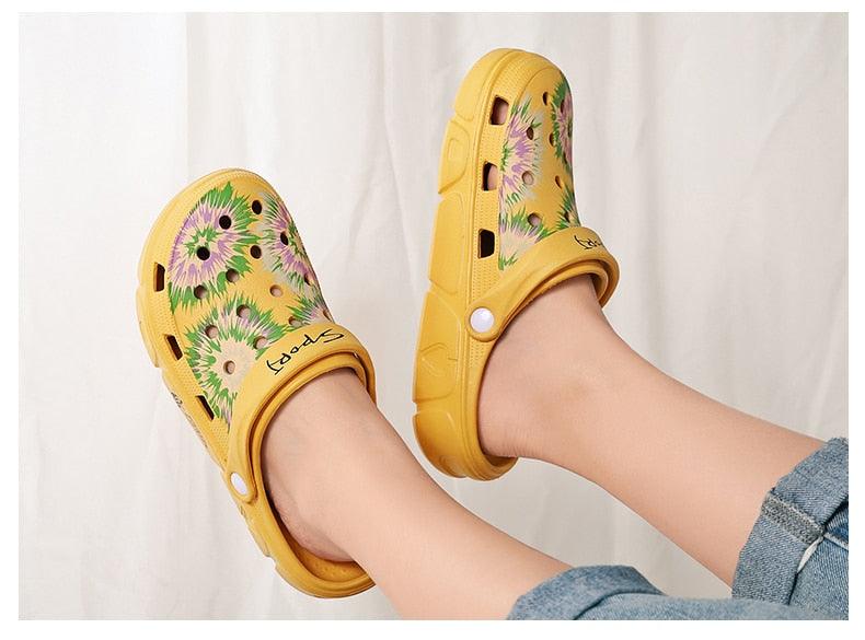 Stevvex women's slip-on sandals, yellow floral print rubber slippers with ventilation holes on Tampa Home & Garden Store