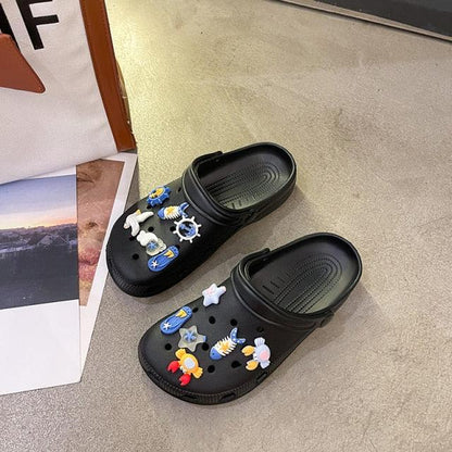 Stevvex black women's garden sandals with colorful sea-themed charms, non-slip lightweight clogs on Tampa Home & Garden Store