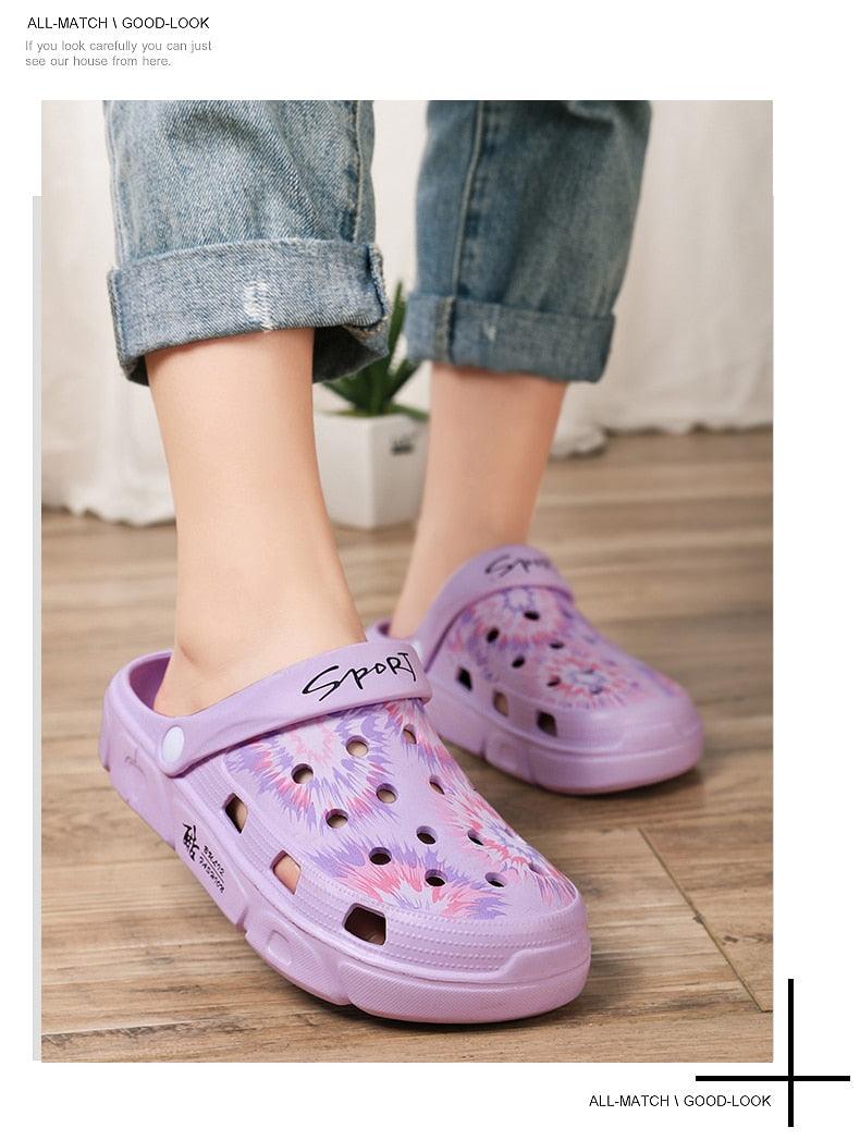 Purple Stevvex garden sandals with perforated upper and floral print, lightweight clog pair on Tampa Home & Garden Store