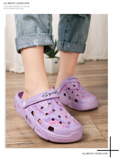 Purple Stevvex garden sandals with perforated upper and floral print, lightweight clog pair on Tampa Home & Garden Store