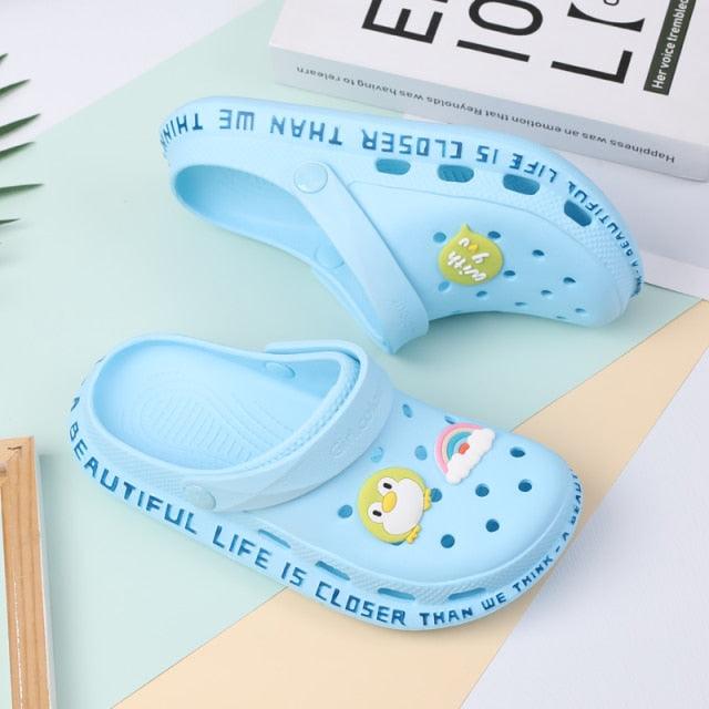 Two Stevvex blue lightweight rubber garden sandals with back strap, non-slip clogs on Tampa Home & Garden Store