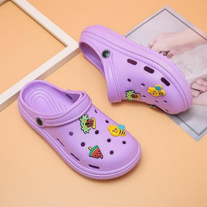 Purple Stevvex pair of women's slip-on clogs with backstrap and fruit prints, lightweight rubber on Tampa Home & Garden Store