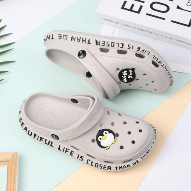 Gray Stevvex women's slip-on sandals with penguin graphic, non-slip rubber sole on Tampa Home & Garden Store