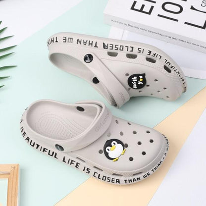 Gray Stevvex women's slip-on sandals with penguin graphic, non-slip rubber sole on Tampa Home & Garden Store