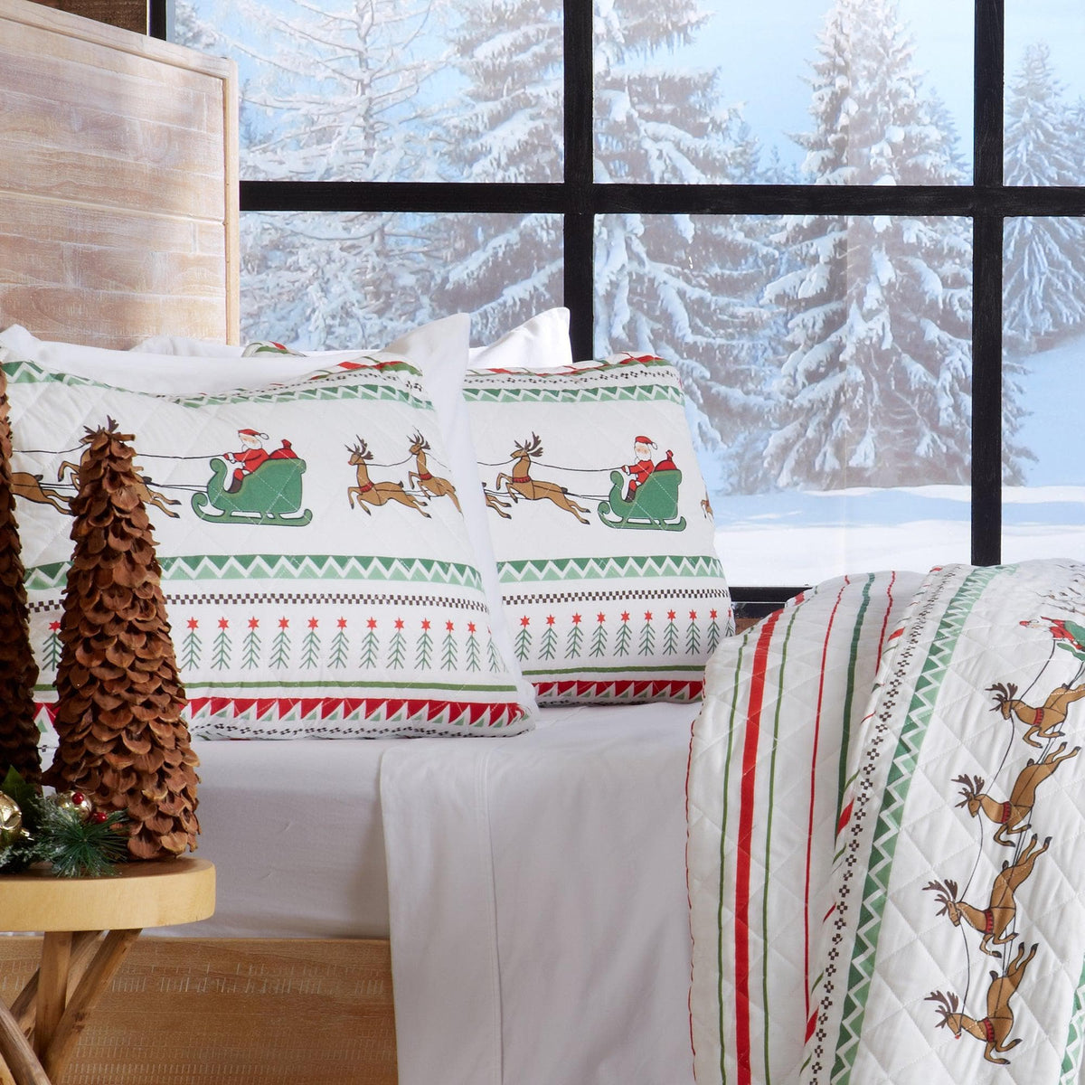 Christmas Quilt Festive Collection by Great Bay Home with green border and reindeer motif on Tampa Home & Garden Store