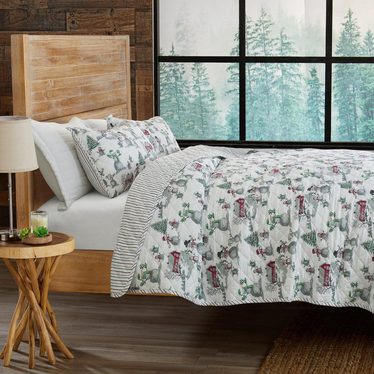 Holiday Printed Quilt Alfie Collection by Great Bay Home on bed with winter village pattern on Tampa Home & Garden Store