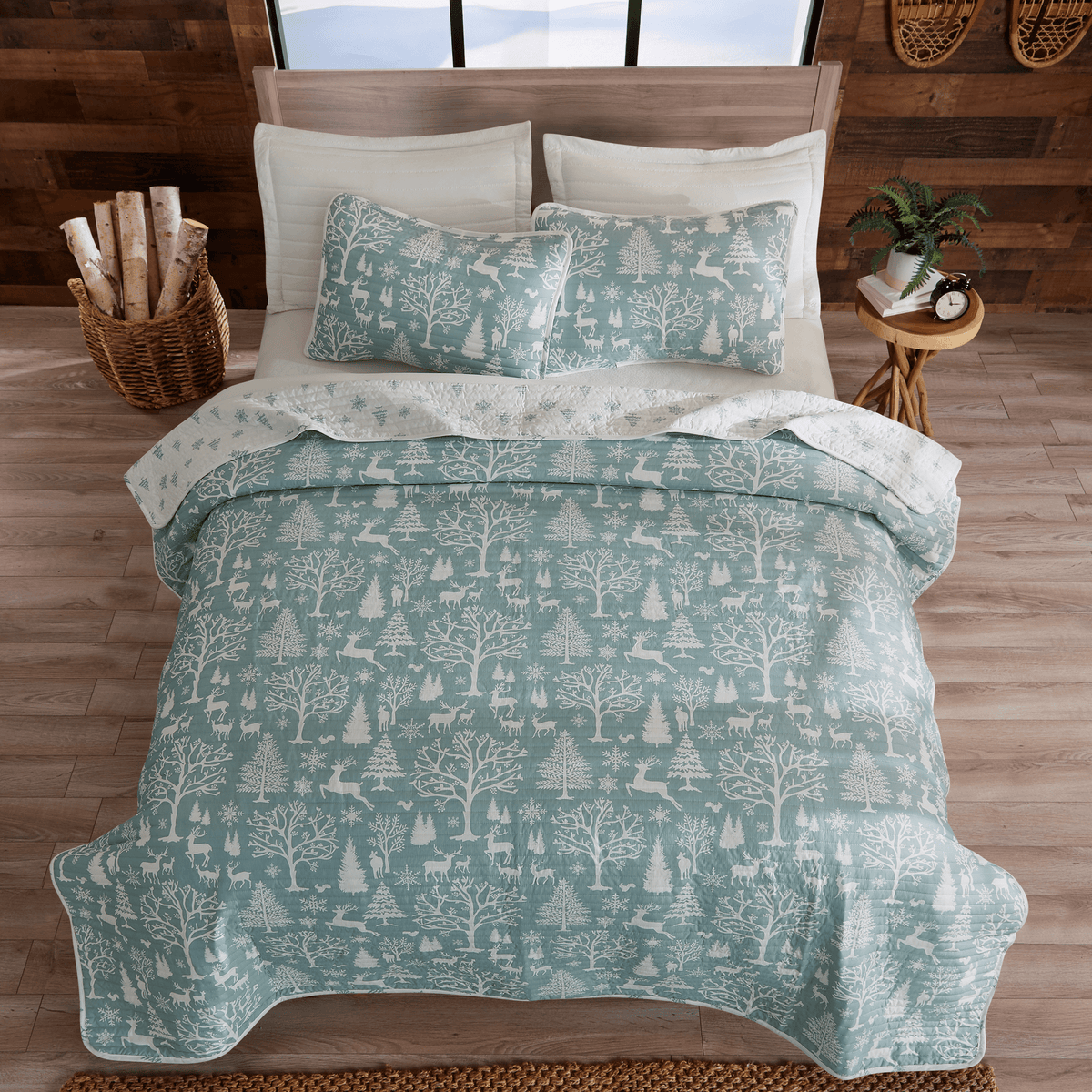 Lodge Woods Quilt by Great Bay Home in teal with white woodland motif on Tampa Home & Garden Store