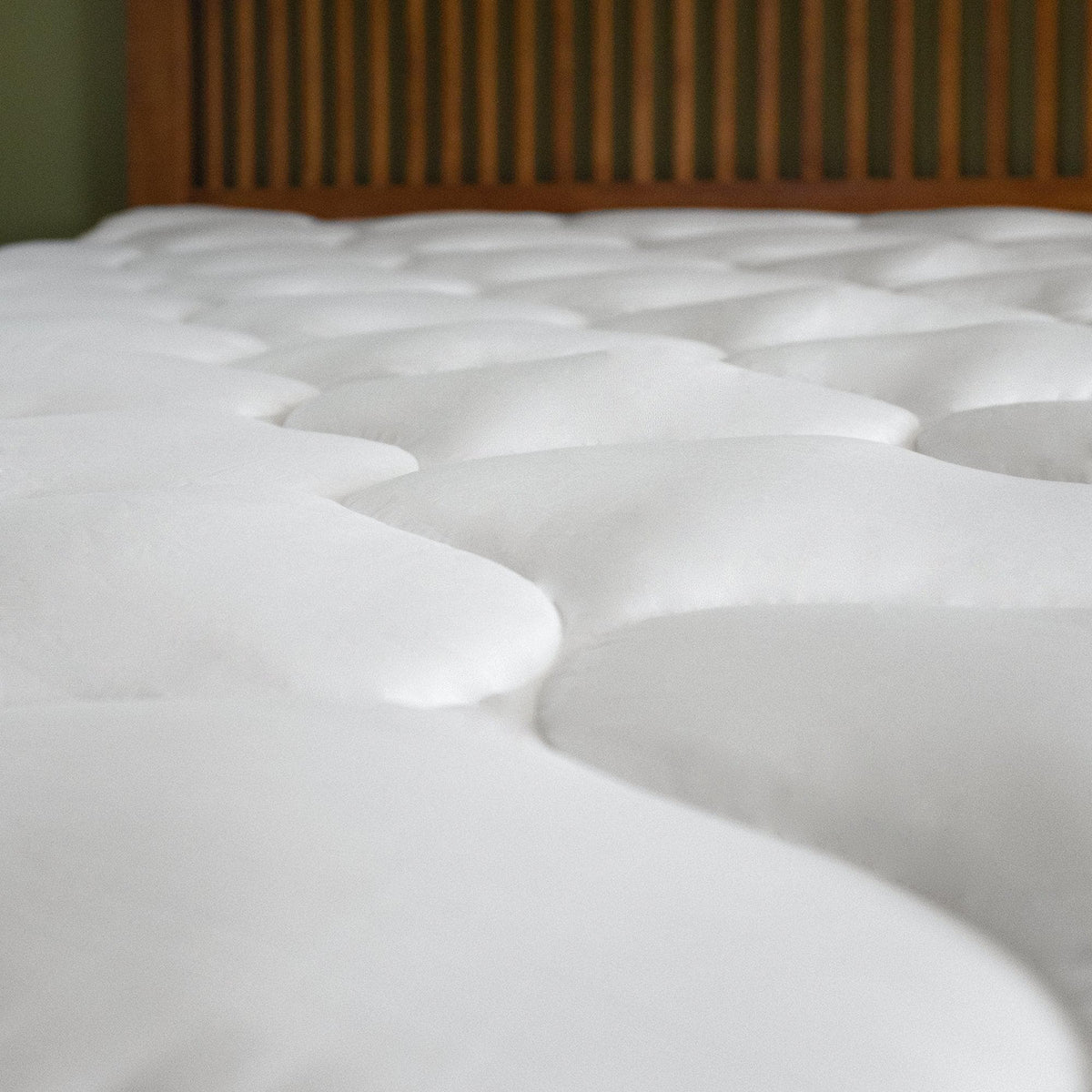 2 Inch Thick Hypoallergenic Mattress Topper Kyla Collection by Great Bay Home on white pad on Tampa Home & Garden Store