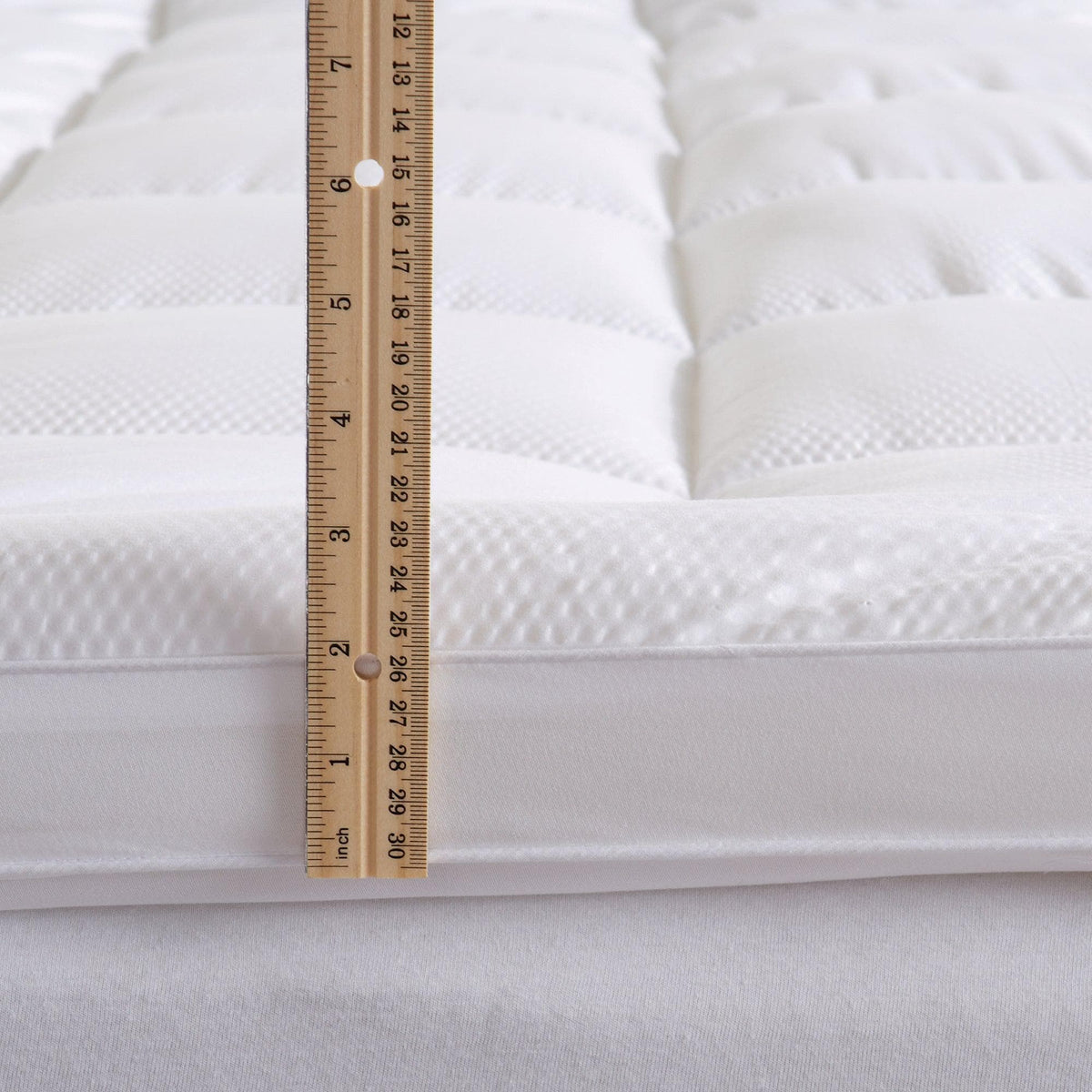 2 Inch Thick Mattress Topper on white quilted pad; ruler shows 2 in thick Great Bay Home on Tampa Home & Garden Store