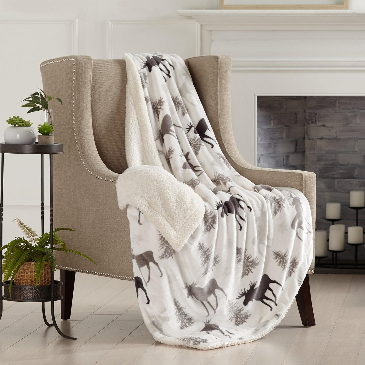 Velvet Plush Sherpa Blanket Cielo ivory tree pattern draped over beige sofa Great Bay Home on Tampa Home & Garden Store