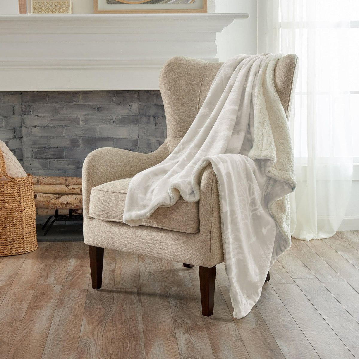 Great Bay Home Velvet Plush Sherpa Bed Blanket - Cielo Collection beige draped over a tan chair on Tampa Home & Garden Store