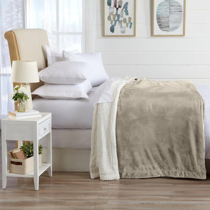 Velvet Plush Sherpa Luxury Bed Blanket by Great Bay Home in taupe beige draped on bed on Tampa Home & Garden Store
