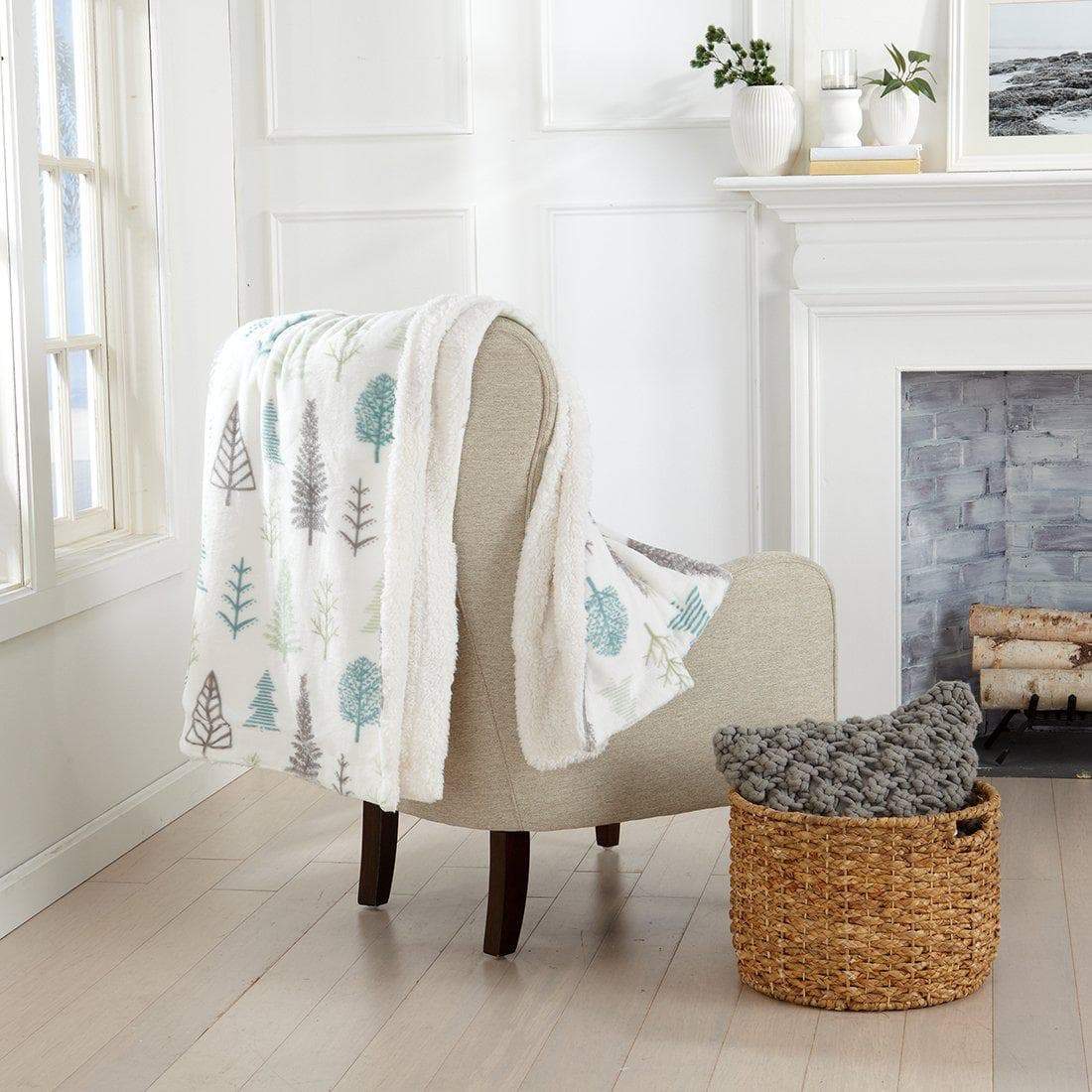 Velvet Plush Sherpa Bed Blanket by Great Bay Home, white tree print draped over beige chair on Tampa Home & Garden Store