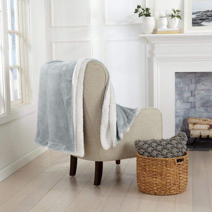 Velvet Plush Sherpa Bed Blanket Kinsley by Great Bay Home gray draped over beige chair on Tampa Home & Garden Store