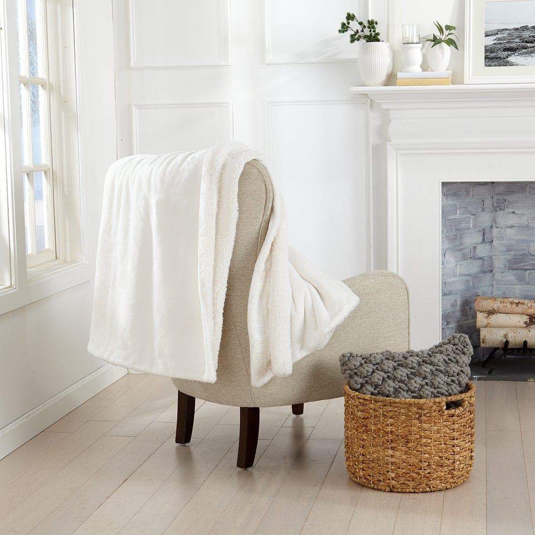 Velvet Plush Sherpa Luxury Bed Blanket Kinsley by Great Bay Home ivory draped over beige chair on Tampa Home & Garden Store
