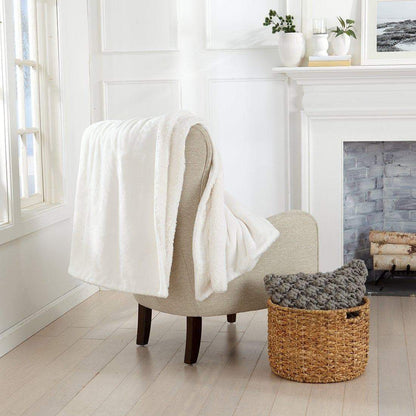 Velvet Plush Sherpa Luxury Bed Blanket Kinsley by Great Bay Home ivory draped over beige chair on Tampa Home & Garden Store