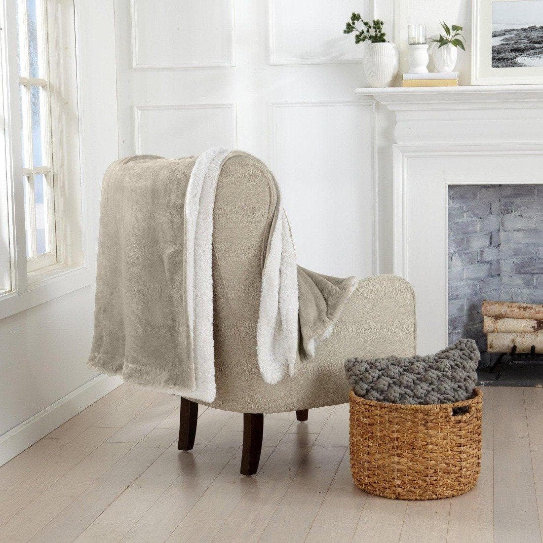 Velvet Plush Sherpa Bed Blanket by Great Bay Home, draped over a chair in a bright room on Tampa Home & Garden Store