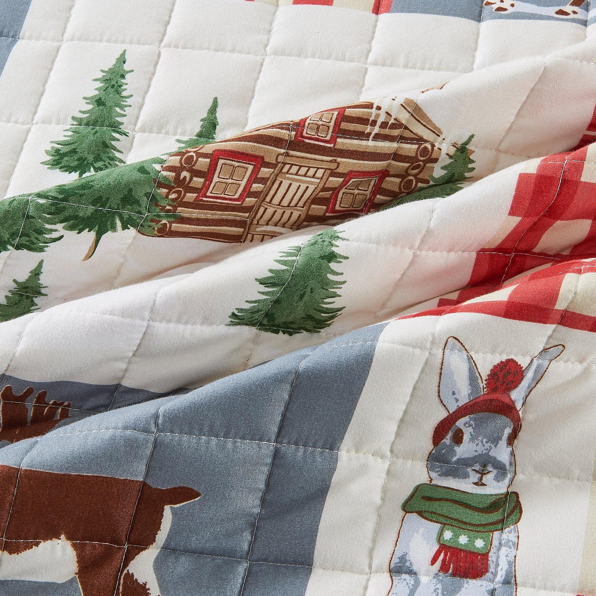 Colorful Holiday Quilt Set Midnight Magic patchwork bedding with evergreen trees on Tampa Home & Garden Store