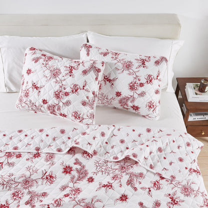 Colorful Holiday Quilt Set Midnight Magic Great Bay Home white quilt with red floral print on Tampa Home & Garden Store