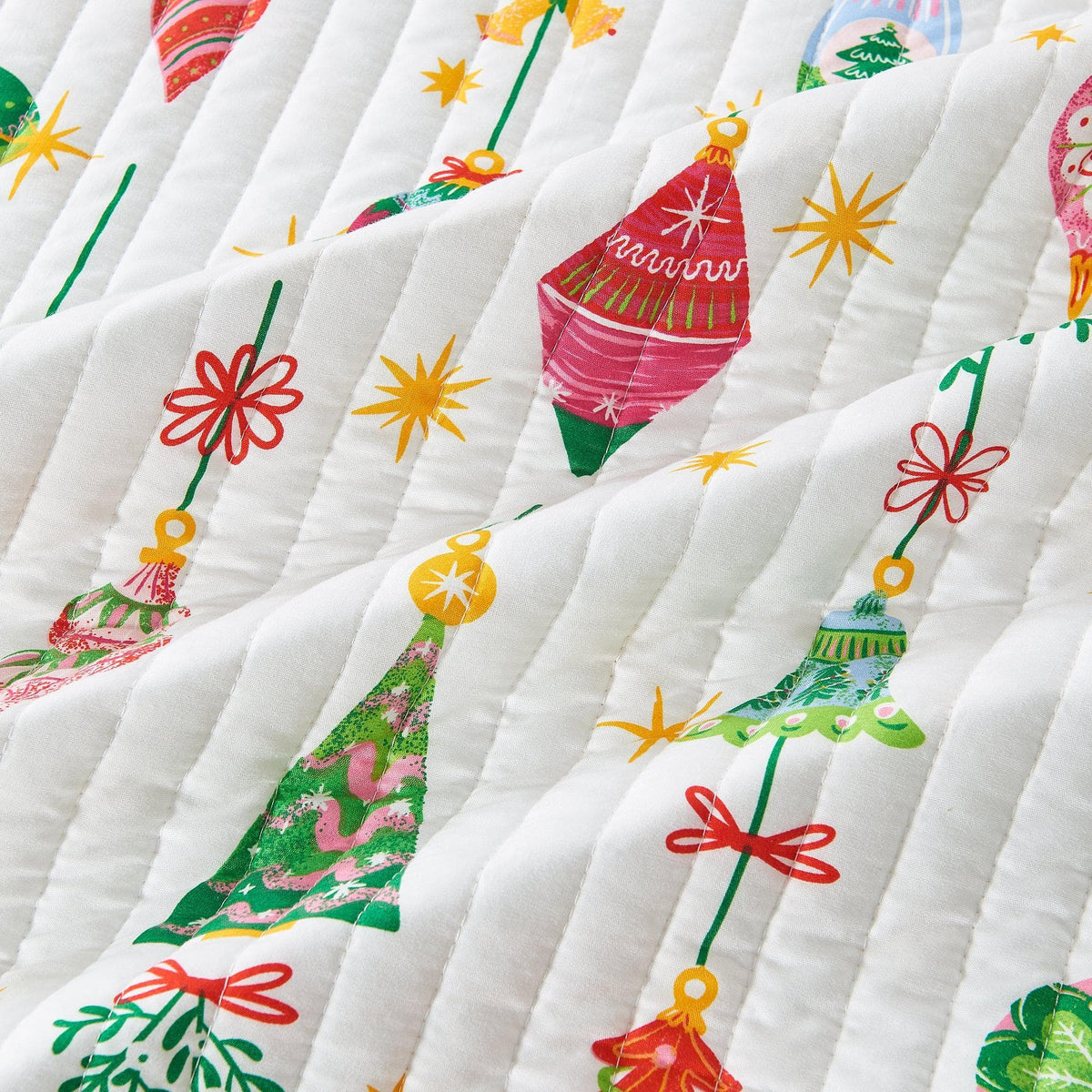 Colorful Holiday Quilt Set Midnight Magic; white quilt with bright festive prints Great Bay Home on Tampa Home & Garden Store