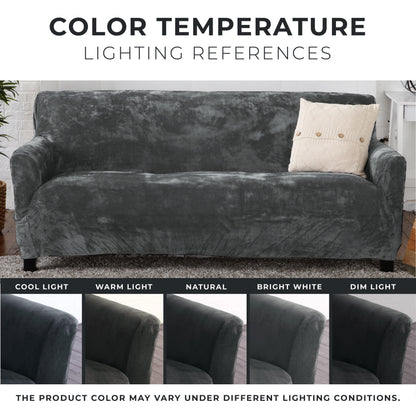 Velvet Stretch Slipcover by Great Bay Home on dark gray velvet sofa with beige pillow on Tampa Home & Garden Store