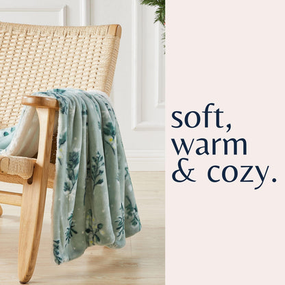 Velvet Plush Sherpa Luxury Bed Blanket - Kinsley Collection in teal floral over wicker chair on Tampa Home & Garden Store