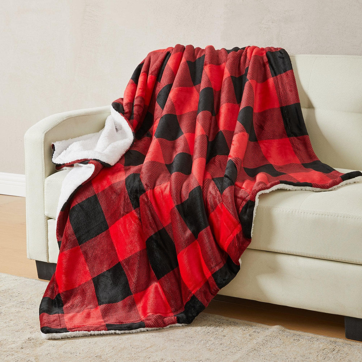 Velvet Plush Sherpa Bed Blanket red black plaid draped over sofa on Tampa Home & Garden Store