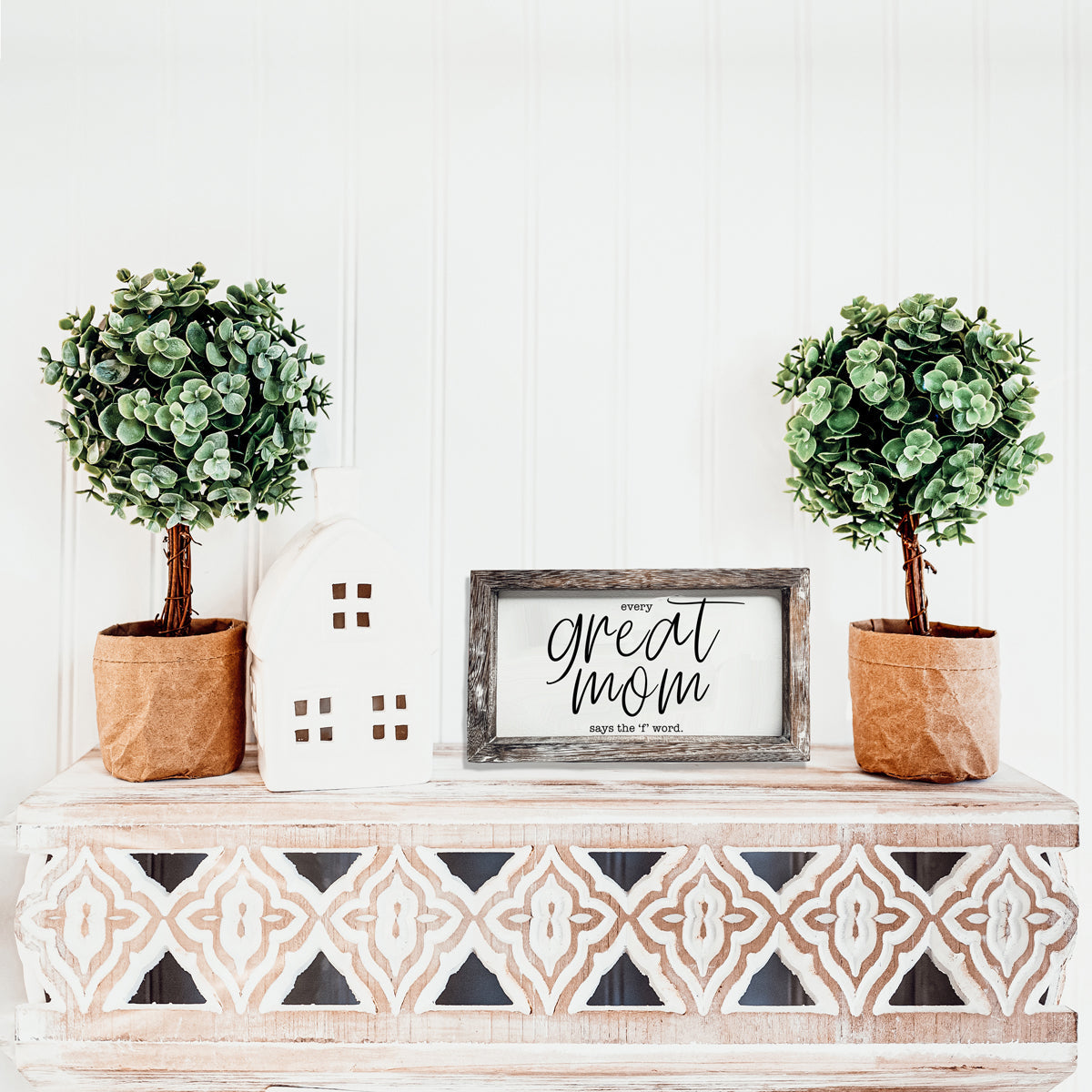 Great Mom sign with frame flanked by two topiary plants on a white table Garden on Tampa Home & Garden Store