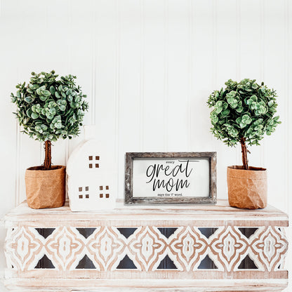Great Mom sign with frame flanked by two topiary plants on a white table Garden on Tampa Home & Garden Store