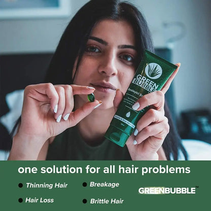 Green Bubble Hair Growth Set green tube held by a woman Beauty Care Bag brand hair care on Tampa Home & Garden Store