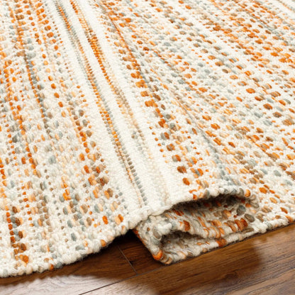 Griet hand woven wool rug Boutique Rugs; ivory field with orange dots and blue-gray accents on Tampa Home & Garden Store